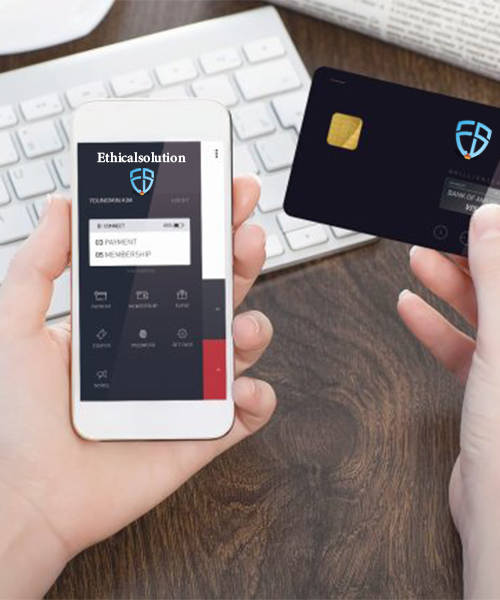 Smartphone and business smart card held in hands with Ethicalsolution logo